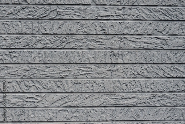 Obraz 風化と経年劣化によるテクスチャ：デコボコの白い壁のクローズアップ