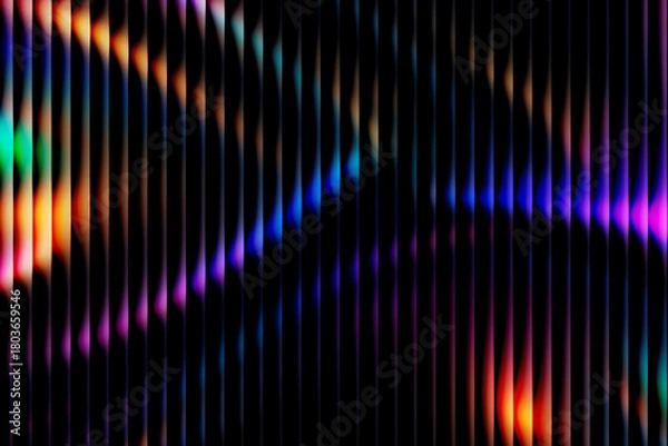 Obraz Abstract colorful background with vertical 3D panels. Blurred neon light effect with orange, blue, and purple gradient spots behind a black striped texture.
