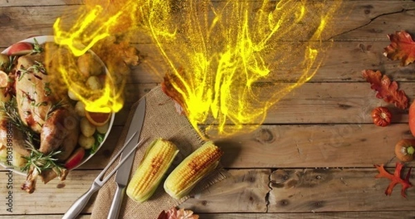 Fototapeta Displaying roasted chicken on platter on wood-plank table with fork, yellow-flame, copy space