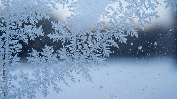 Fototapeta Intricate frost patterns on a window pane in winter