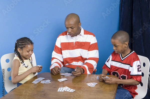 Fototapeta children playing with their father