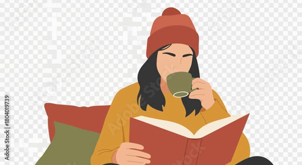 Fototapeta Person wearing a beanie drinks from a mug while reading a book.