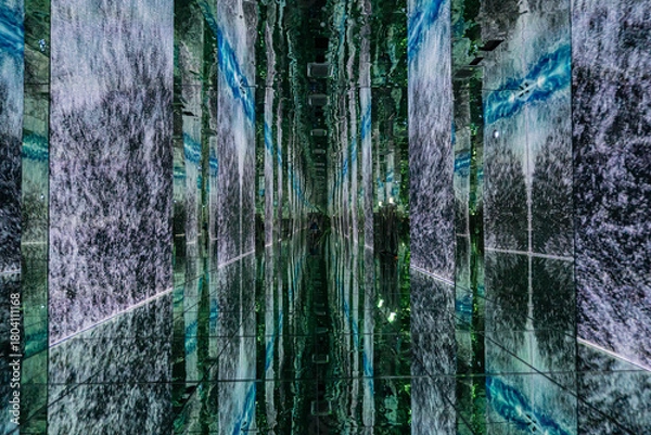 Fototapeta The light reflects off the mirror in a long path.