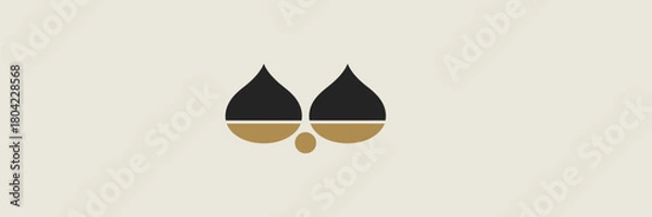 Fototapeta Abstract owl face design with black teardrop shapes and gold accents on a light beige background art