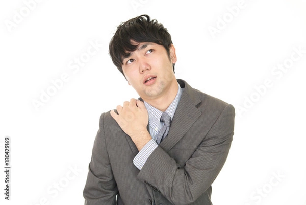 Fototapeta 疲れた表情のビジネスマン