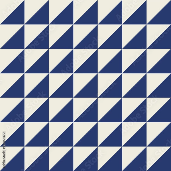 Fototapeta Seamless geometric pattern with diagonally into a dark blue triangle and an off-white triangle.