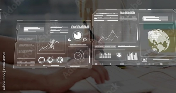 Fototapeta Typing hands with light sleeves pressing laptop keys at office desk, showing AR dashboards, papers