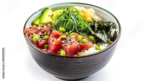 Fototapeta Close up of a poke bowl with tuna avocado edamame seaweed and rice on a white background