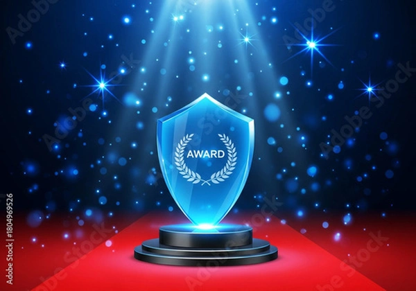 Fototapeta A glowing blue shield award with the word award and a laurel wreath sits on a pedestal under spotlights on a red carpet, surrounded by bokeh lights