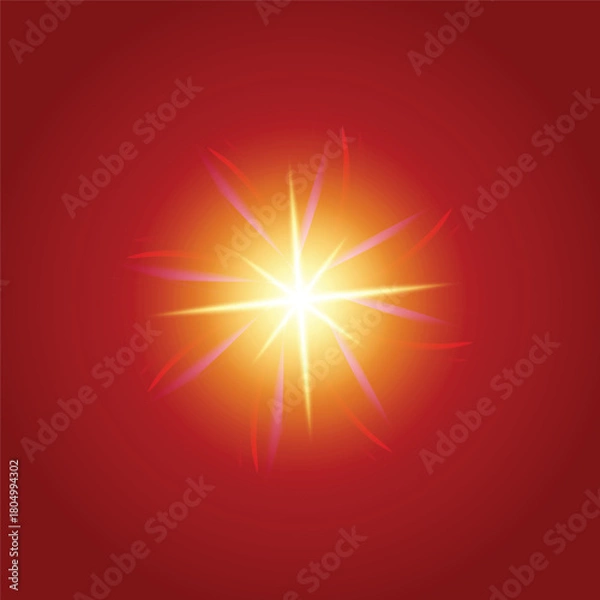Fototapeta Bright golden starburst light flare with glowing rays on a red background