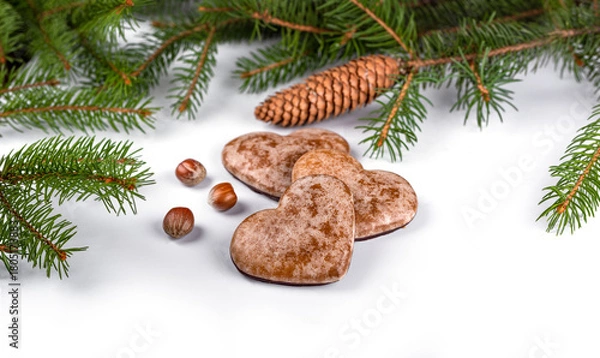 Obraz gingerbread with christmas tree sprig and pine cones