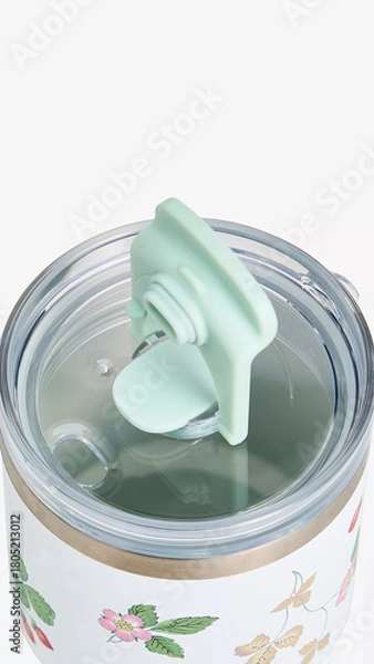 Fototapeta Stylish reusable tumbler with floral design and easy-open lid for refreshing drinks at home or on the go.