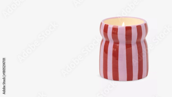Fototapeta Unique striped candle holder designed for cozy atmosphere in home decor.