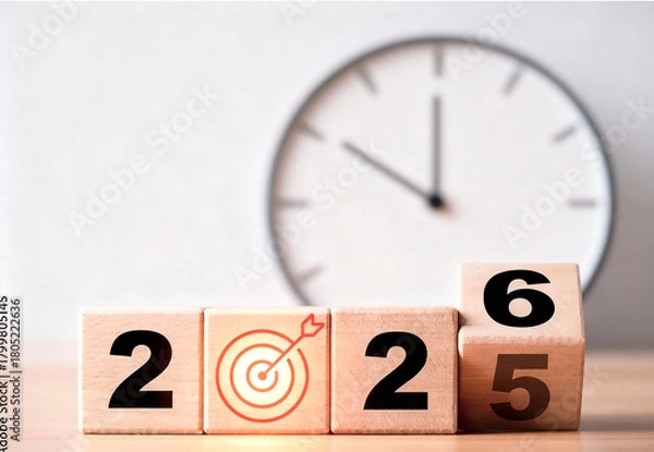 Fototapeta Imagem criativa e moderna de blocos de madeira alinhados, representando a virada do ano de 2025 para 2026, com números destacados, relógio e alvo estilizados, fundo claro e toque elegante