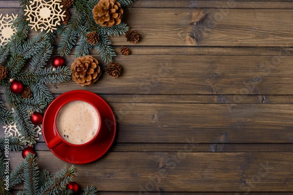 Obraz Red cup with coffee and Christmas decoration