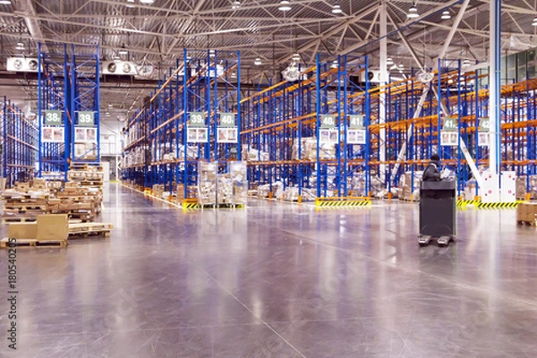 Fototapeta Typical storage, warehouse interior. Selective focus.