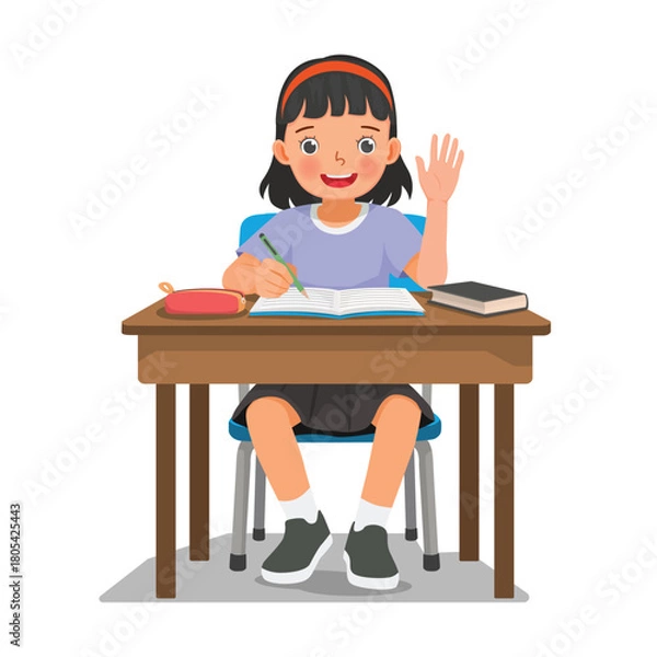 Fototapeta Little girl studying sitting at the desk writing on notebook waving hand