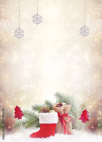 Fototapeta Christmas background with decorative Santa's red boot and gift bag, lollipop candy and fir tree branch. New Year winter holidays fantasy card with decor and copy space, festive postcard.