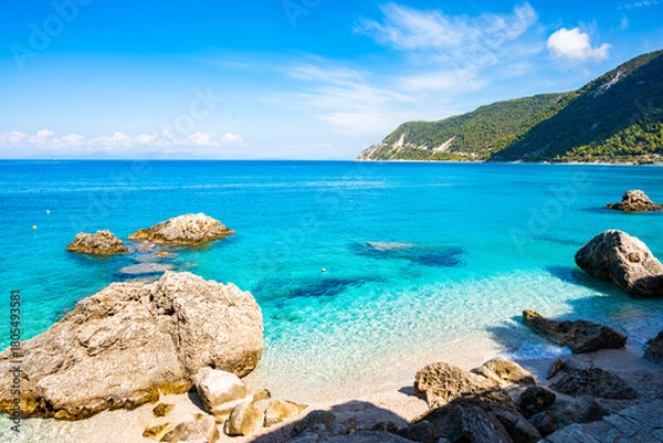 Fototapeta View of rocks in crystal clear turquoise sea on Agios Nikitas beach, Lefkada island, Greece