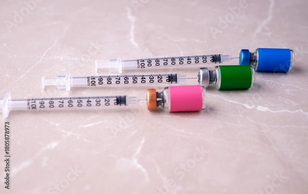 Obraz Single Use Syringes With Glass Vials with Various Labels