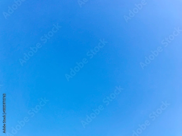 Fototapeta Vivid Deep Blue Sky Smooth Gradient Clean Background with Copy Space on West Lake in Hanoi, Vietnam