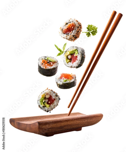 Obraz Sushi pieces hover above a wooden rest with chopsticks
