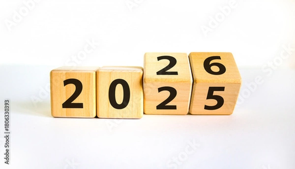 Obraz New Year Transition Concept with Wooden Cubes 2025 → 2026