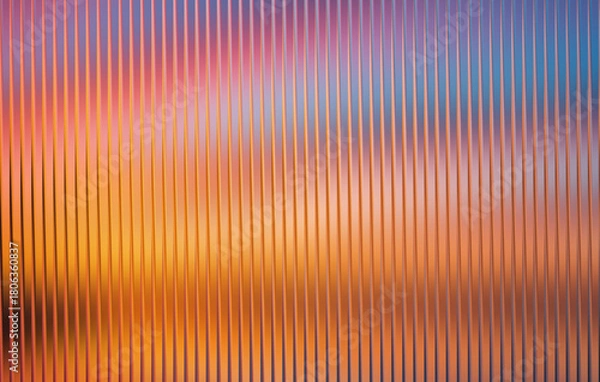 Obraz Abstract textured background with vertical ribbed lines in vibrant sunset gradient of orange pink and blue hues