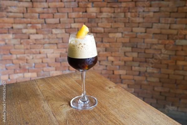 Obraz Espresso coffee with orange juice on table and brick background,cafe house,travel morning coffee.