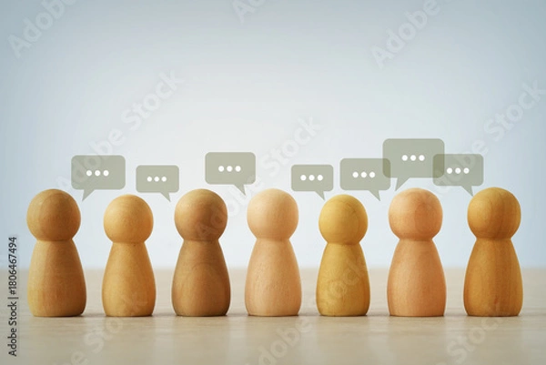 Obraz Grupo of wooden pawns with speech bubbles - Concept of communication and diversity