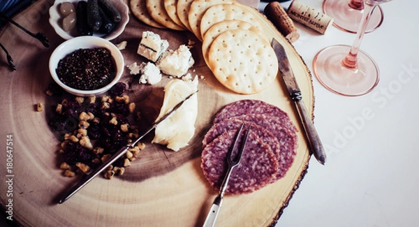 Fototapeta Cutting board meat, cheese, wine vignette 