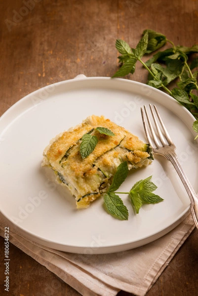 Obraz Zucchini flan with cheese and mint leaves