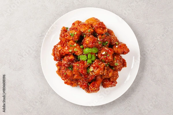 Fototapeta  닭튀김은닭고기에 밀가루, 겨잣가루, 소금, 후추 따위를 묻혀 기름에 튀긴 요리.
Fried chicken is a dish made by coating chicken in flour, mustard powder, salt, pepper, etc. and frying it in oil.
