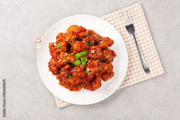 Fototapeta  닭튀김은닭고기에 밀가루, 겨잣가루, 소금, 후추 따위를 묻혀 기름에 튀긴 요리.
Fried chicken is a dish made by coating chicken in flour, mustard powder, salt, pepper, etc. and frying it in oil.
