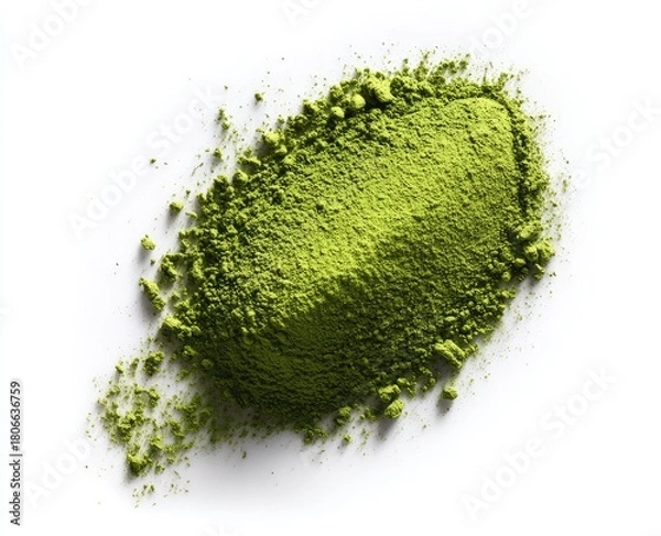 Fototapeta A heap of vibrant green matcha powder, scattered slightly, on a white background