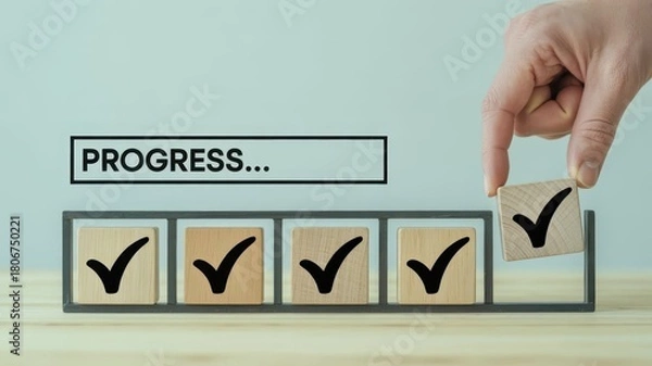 Fototapeta Human hand places final wooden block with checkmark into progress bar sequence