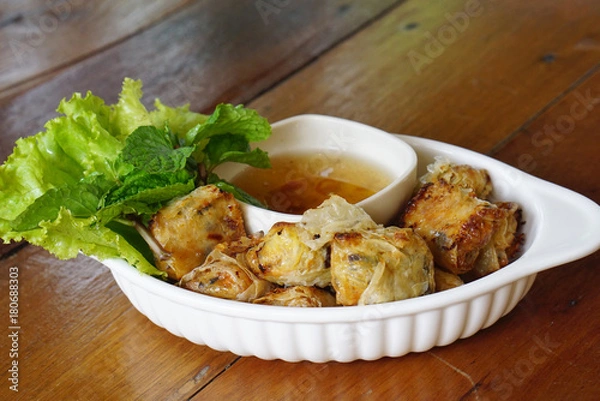 Obraz deep fried spring rolls serving with plum sauce