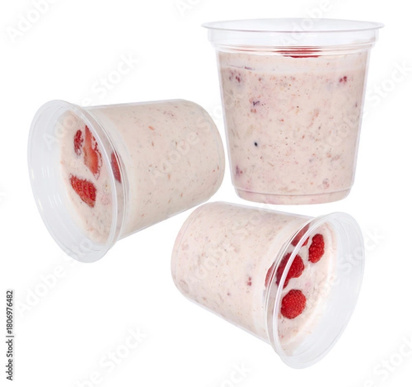 Obraz Raspberry yogurt in plastic cups cut out isolated transparent background