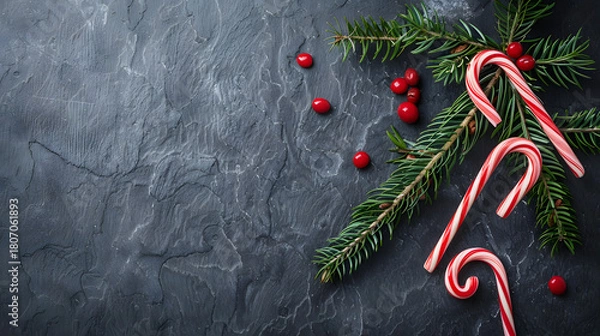 Fototapeta Christmas Card - Loading Concept - Tree And Candy Canes On Black Stone 