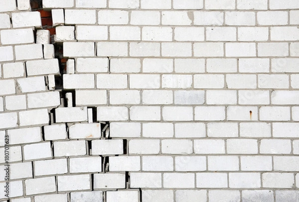 Obraz Brick wall with a crack for your design