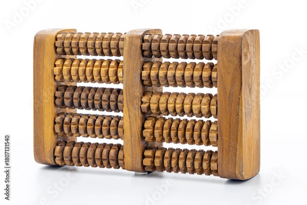 Fototapeta Wooden Foot Massager with Grooved Rollers Designed to Relieve Tension and Improve Circulation