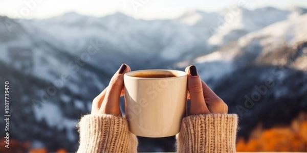 Fototapeta A girl holds a mug of hot drink, coffee, tea against the background of winter mountains in the camp. Generative AI.