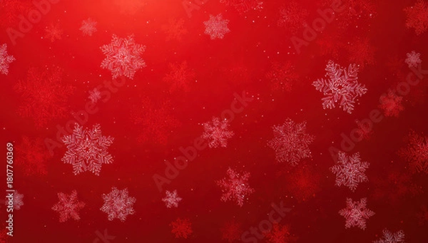 Fototapeta Vibrant red Christmas background with elegant white snowflakes falling gently through the air.