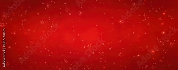 Fototapeta A festive red background with subtle snowflake patterns, perfect for holiday designs.