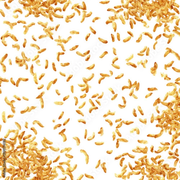 Fototapeta Scattered, curved, brown objects cover a black background