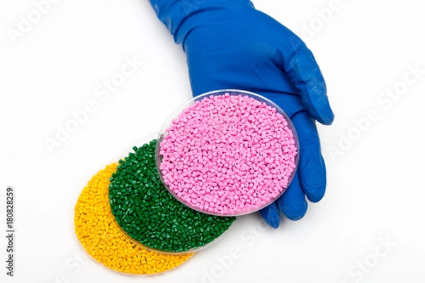 Fototapeta Plastic pellets. Polymeric dye.  Colorant for plastics in the granules.