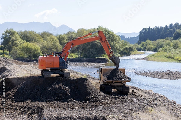 Obraz 河川の河道拡幅工事をする重機