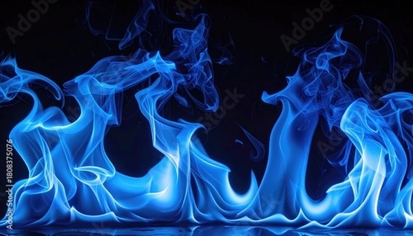 Fototapeta Vivid Blue Flames against a black background, with detailed and artistic flames and smoky effects. The mesmerizing effect gives the fire a unique look