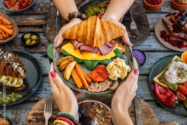 Obraz Croissant sandwich filled with ham, bacon, cheese and salad.  croisandwich