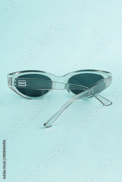 Fototapeta The color contrast helps emphasize the lens clarity and frame design